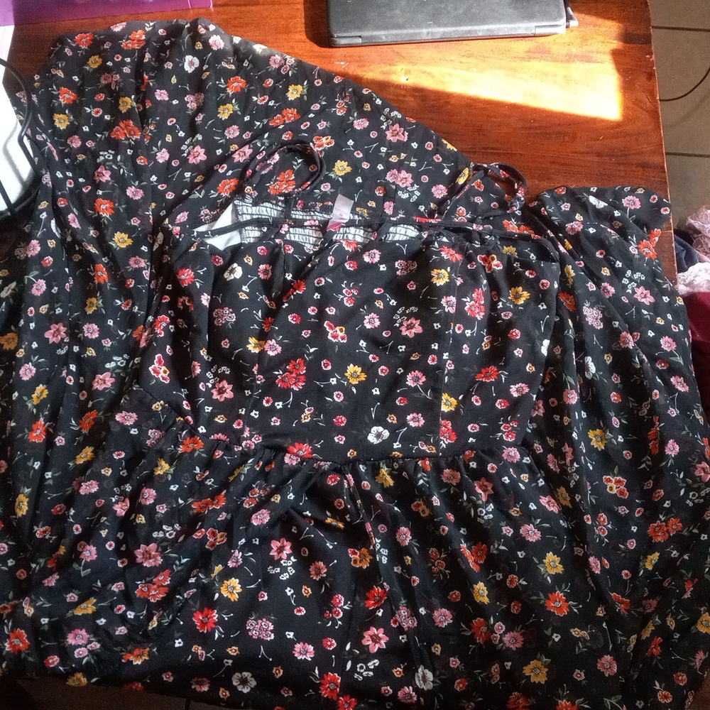 Floral black short romper with half skirt